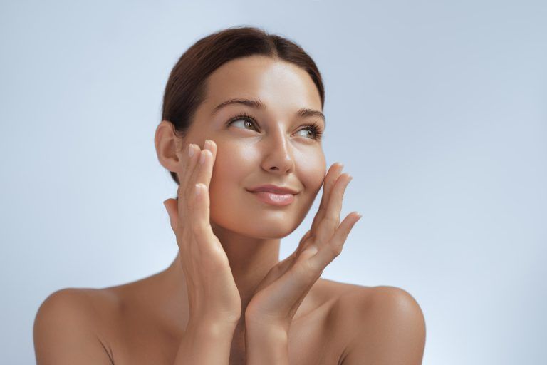 Cosmetics Skin Care Concept Photo of Close-up Woman Perfect Face with Hydrated Skin